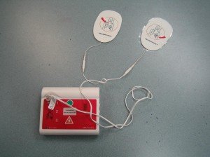 AED trainer with pads for adults